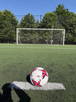 Strykr Flight Pro size 5 soccer ball on turf field in front of goal